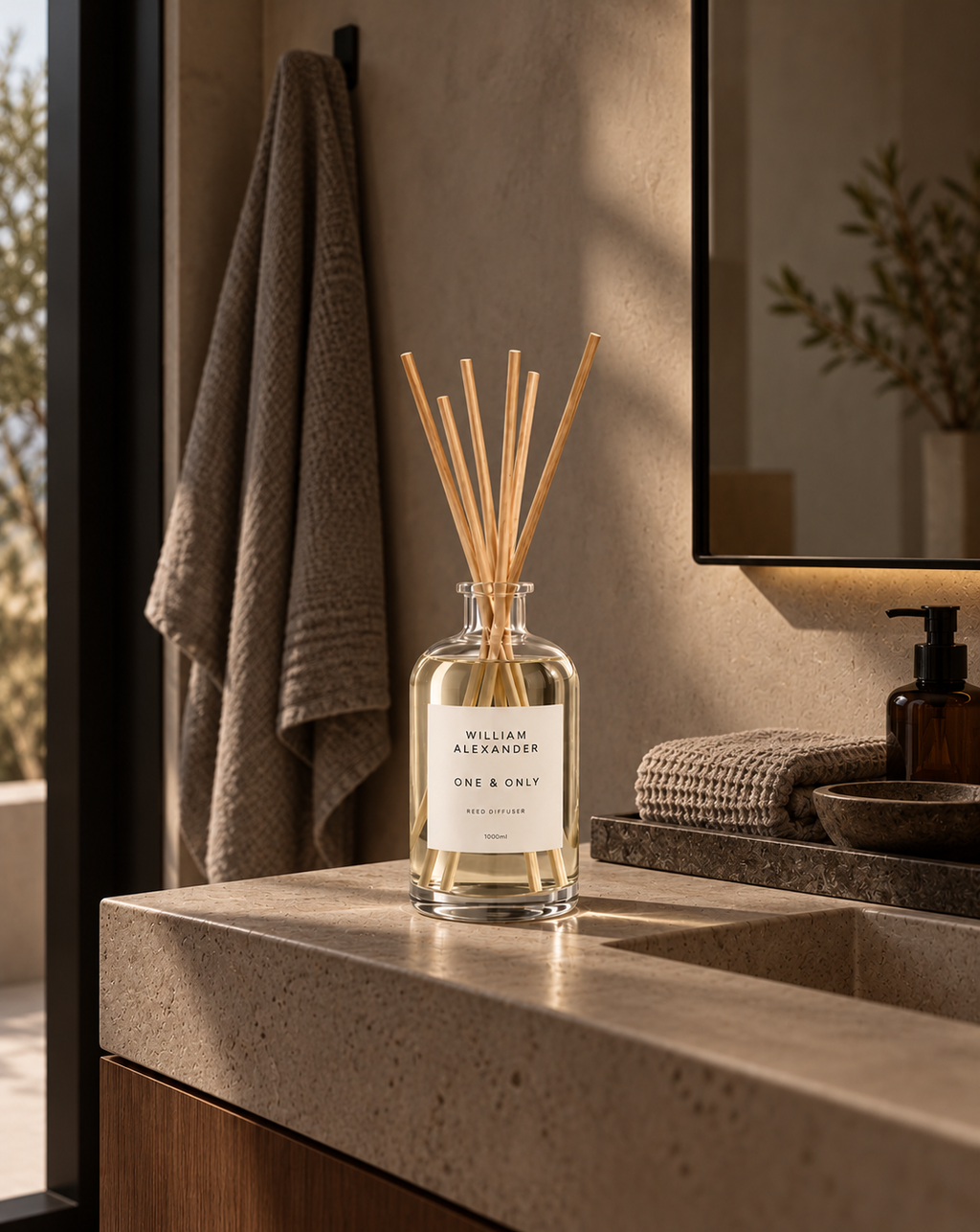 Large Reed Diffuser 1000ml on a stone bathroom vanity with folded towels